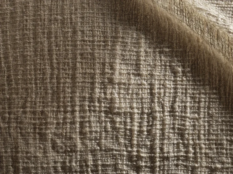 Macro d'un tissu de lin écru montrant les fils et les irrégularités du tissage
